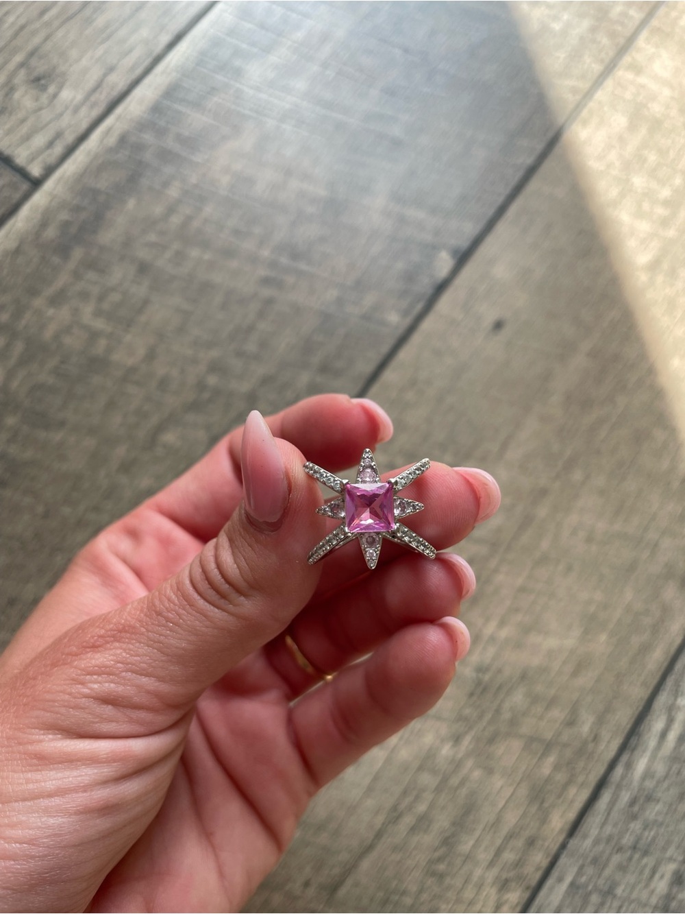 Lab created pink corundum ring with rhodium plating